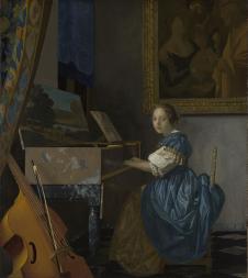 维米尔作品: 维金纳琴旁的年轻女子 - a young woman seated at a virginal
